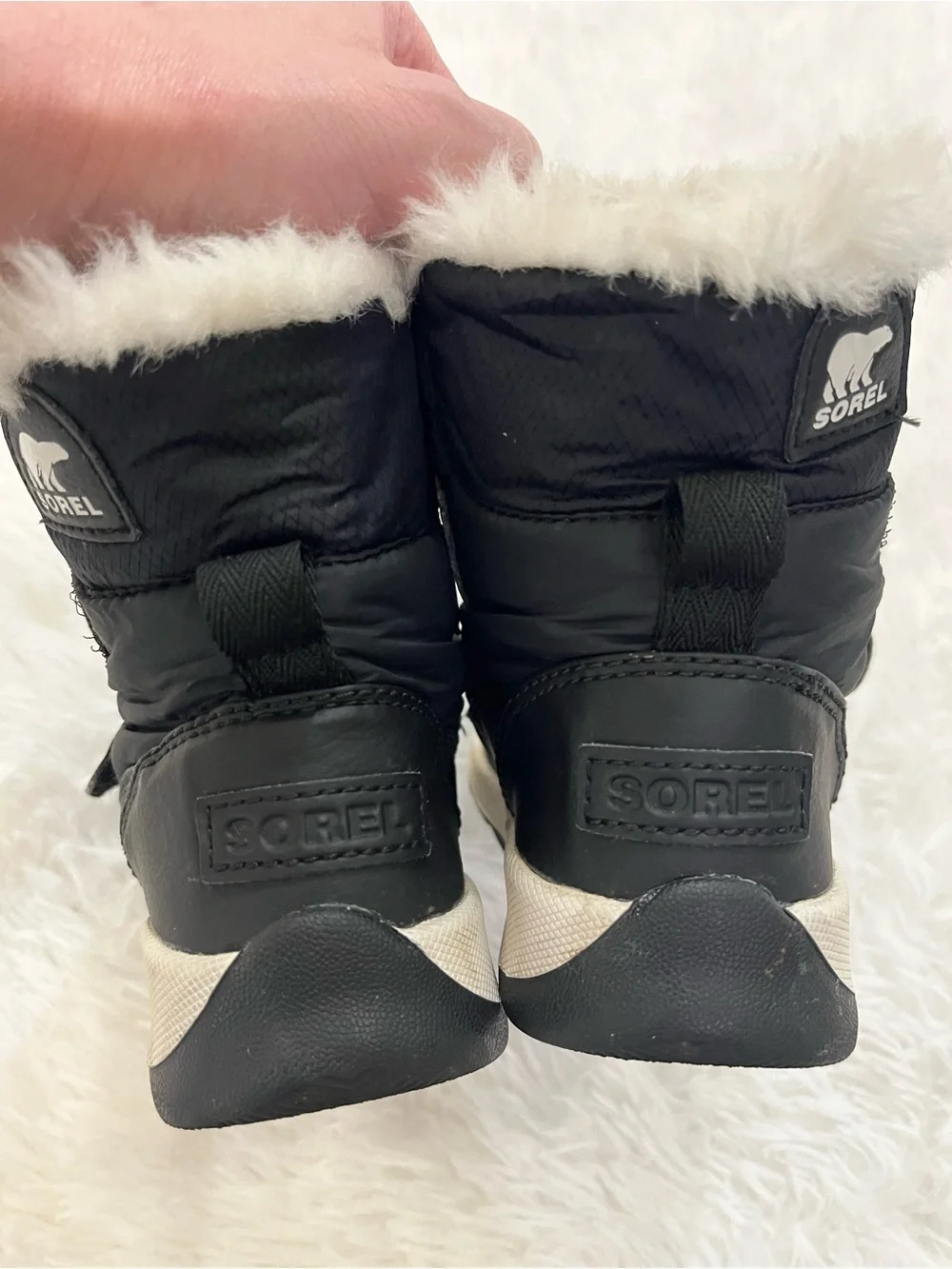 SOREL Kids black and white faux fur winter boots